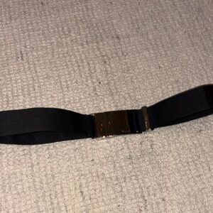 Women elastic Salvatore Ferragamo Black Belt 
With shiny silver sleek buckle